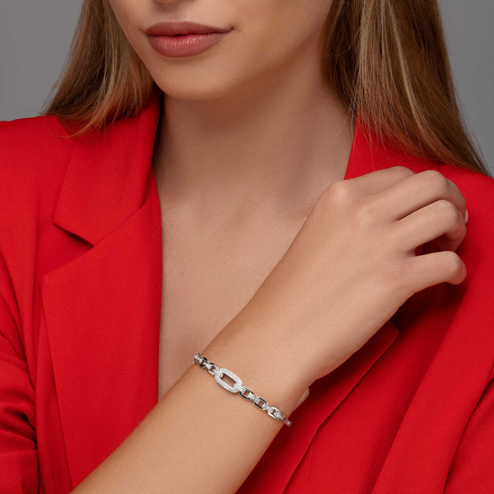 צמיד זואי- זהב קשיח ושיבוץ זרקונים