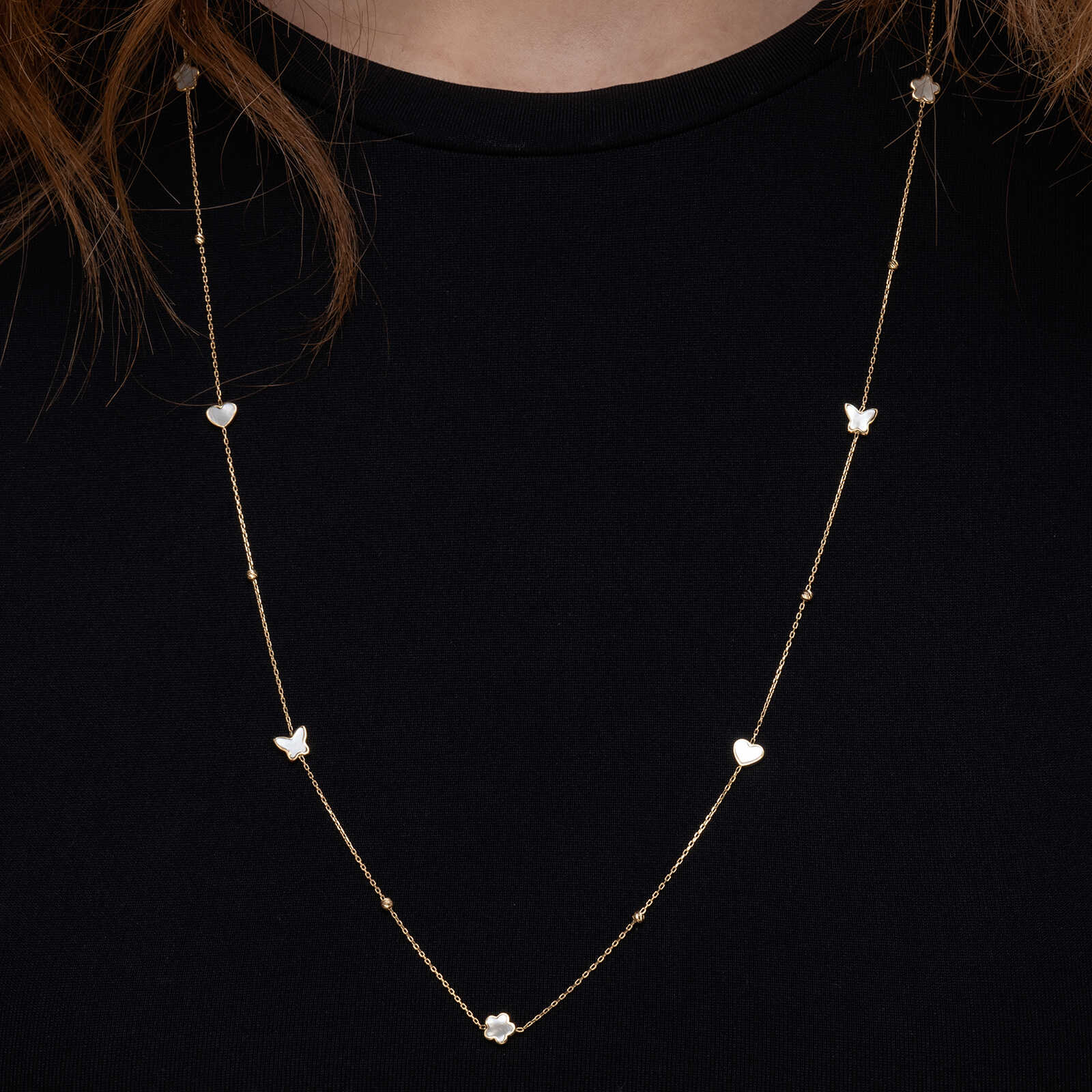 שרשרת זהב בשיבוץ צדף