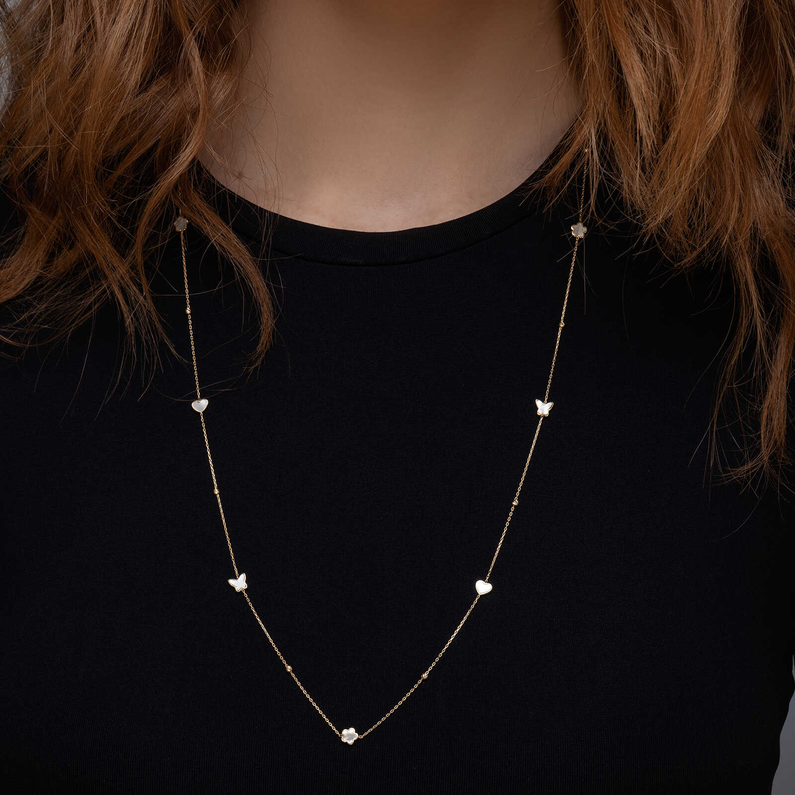 שרשרת זהב בשיבוץ צדף