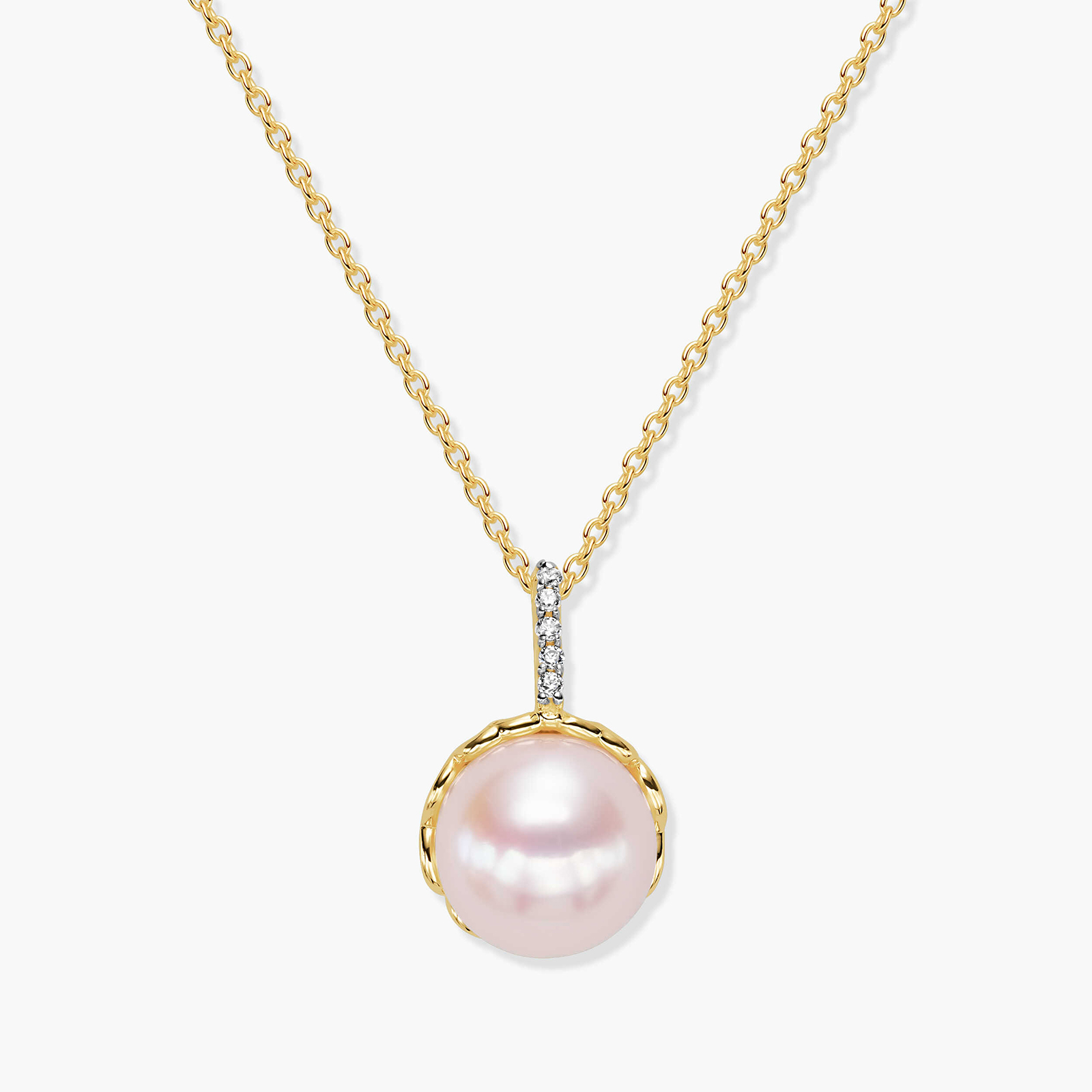 תליון זהב משובץ פנינה וזרקונים