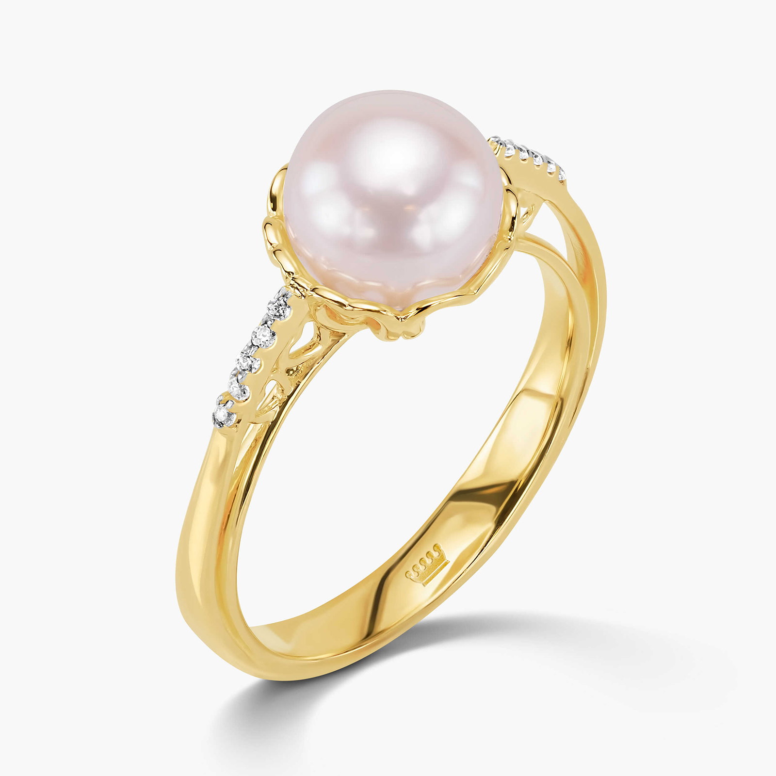 טבעת זהב משובצת פנינה וזרקונים