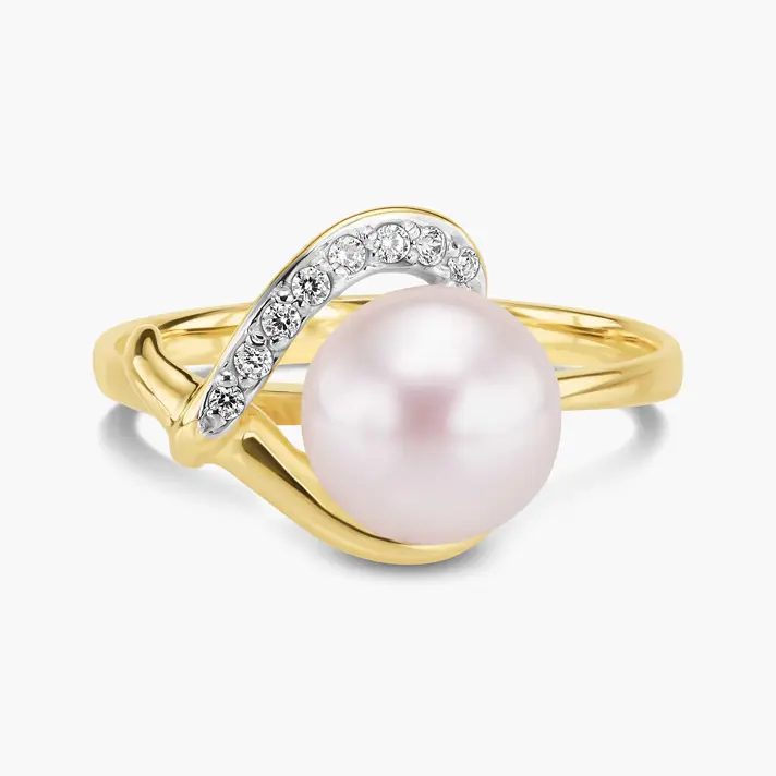 טבעת זהב משובצת פנינה וזירקונים